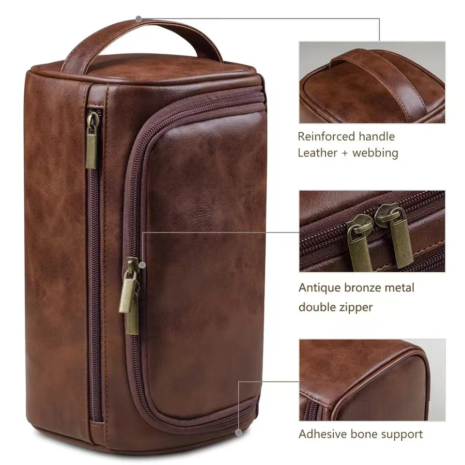A brown leather toiletry bag with a reinforced handle, featuring antique bronze metal zippers and an adhesive bone support.