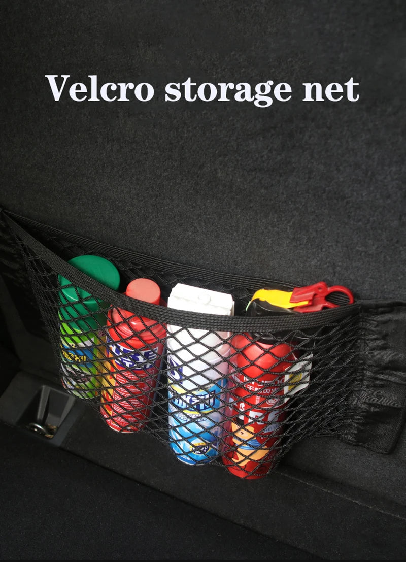 Black velcro storage net bag filled with various colorful items like bottles and containers.