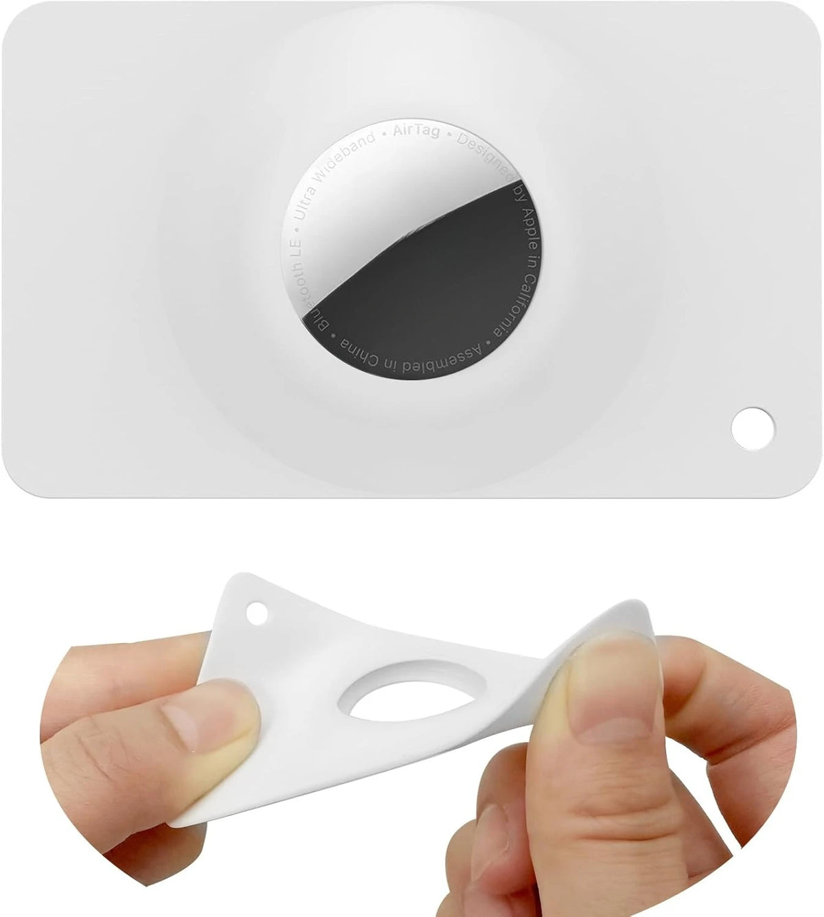 A white MagSafe card wallet with a built-in pocket for an AirTag, shown being held by a hand.