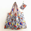 A patterned fabric folding shopping bag featuring cute animal characters like Miffy and others.