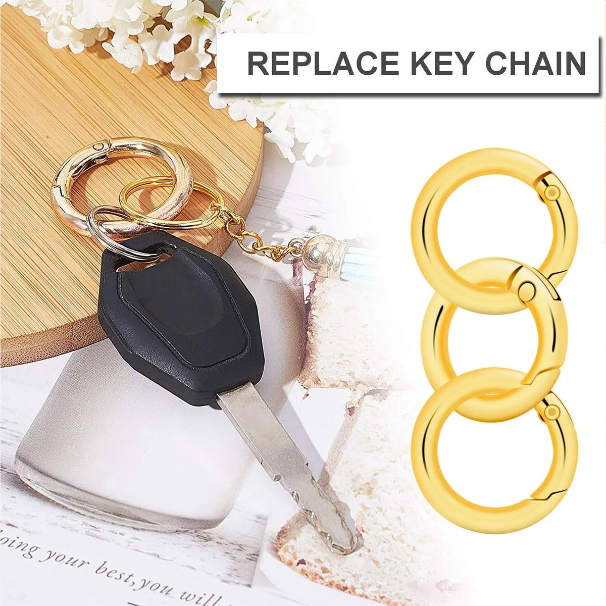 A set of gold-colored key chains and metal key rings displayed next to a key.