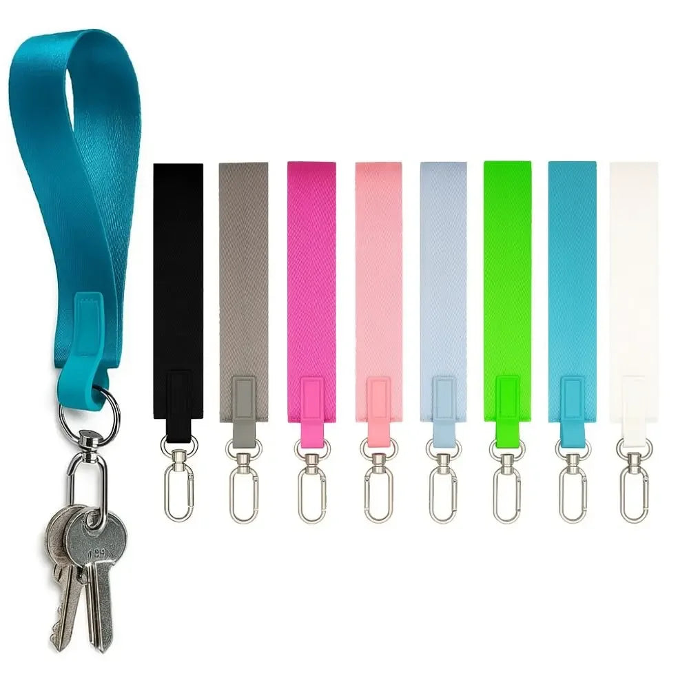Multicolor nylon wrist strap keychains featuring various colored straps and metal split rings.