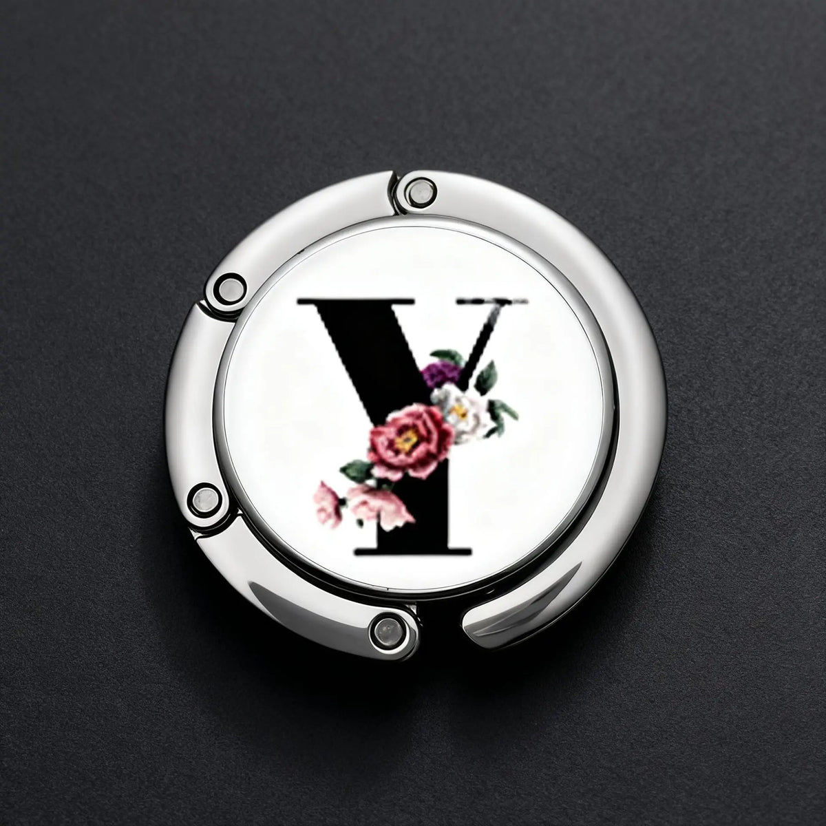 Silver foldable letter hanger hook with a stylized letter Y and floral accents