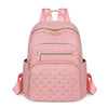 Pinkes gestepptes Kunstleder-Daypack mit verstellbaren Riemen und Reißverschlüssen.