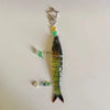 A simulation fish keychain featuring a green body, yellow accents, and a silver star charm.