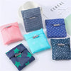 A collection of colorful fabric bags with the BAGCU logo displayed on a white background.