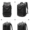 Black heavy duty laptop backpack shown in angle presentation with vacuum compression features.