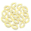 A collection of light yellow acrylic link chain connectors for DIY jewelry and bag making