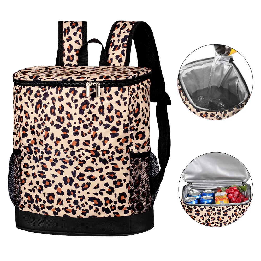 A leopard print cooler backpack with a black strap and an attached clear storage bag.