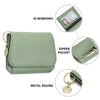 A light green genuine leather slim tri-fold wallet featuring ID windows, a zipper pocket, and a metal round charm.