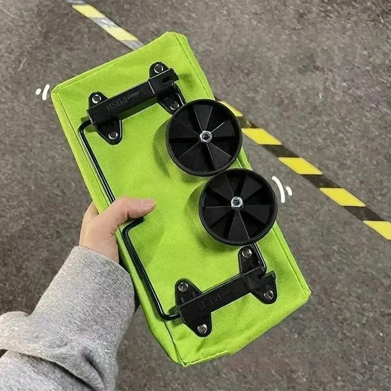 A hand holds a bright lime green folding shopping trolley bag with black handles and circular compartments.