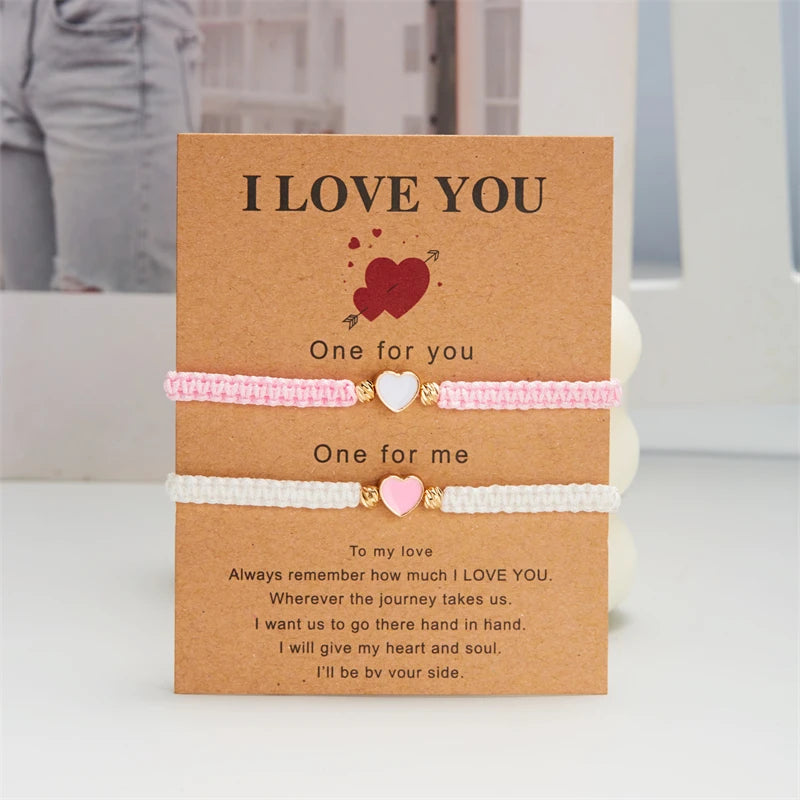 A set of three heart beaded friendship bracelets with 'I love you' messages for couples