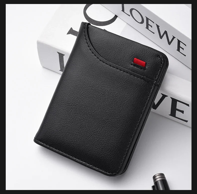 A black slim bi-fold wallet for men with multiple card slots resting on a white surface.