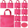 A collection of bright pink non-woven tote bags in various sizes and styles.