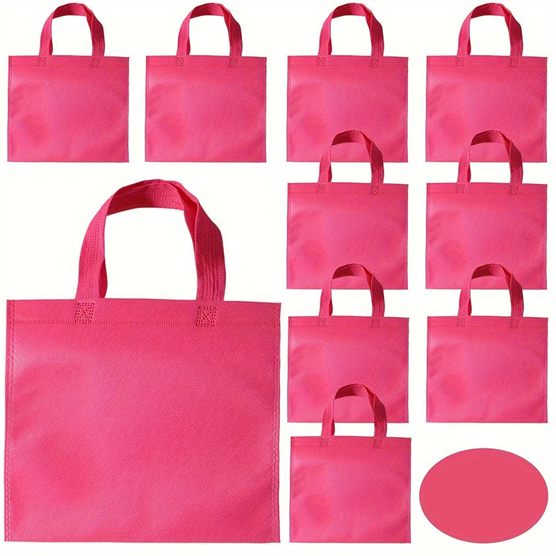 A collection of bright pink non-woven tote bags in various sizes and styles.