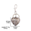 Silver keychain featuring a leopard print bow and heart charm.