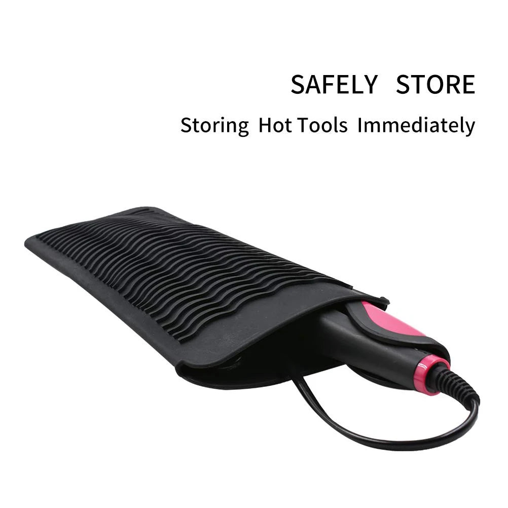 Black heat-resistant silicone mat used for storing hot styling tools.