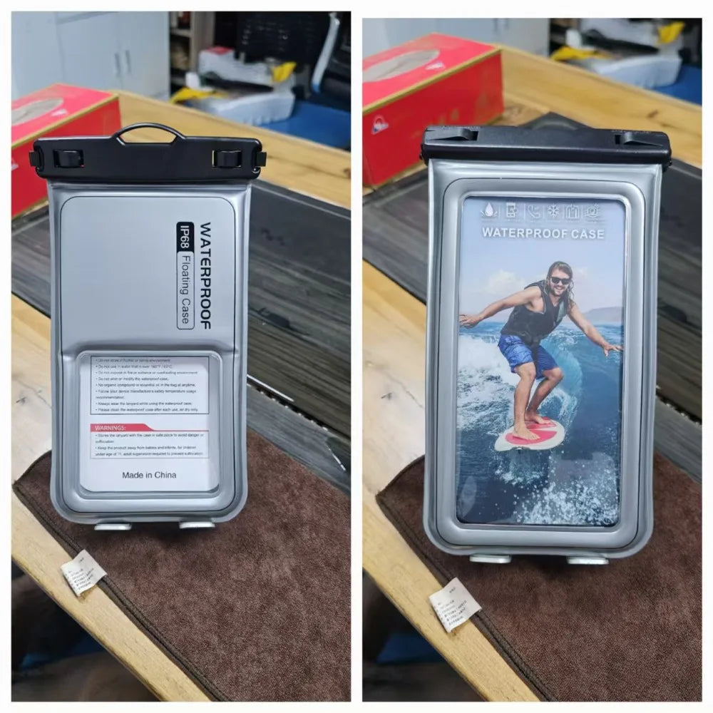 A silver waterproof phone case with a black strap is shown next to a person surfing on the ocean.