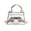 Silver metallic square crossbody bag with a chain strap