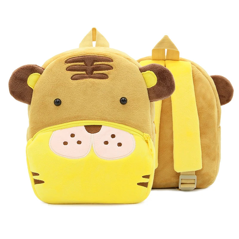 A yellow cartoon animal plush backpack shaped like a lion face with brown ears and stripes.