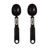 A pair of black precision digital kitchen scales with measurement displays.