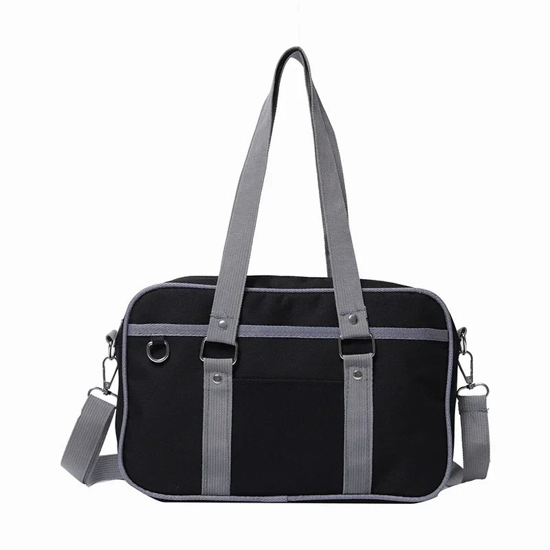 A black and gray preppy PU shoulder bag designed for students.