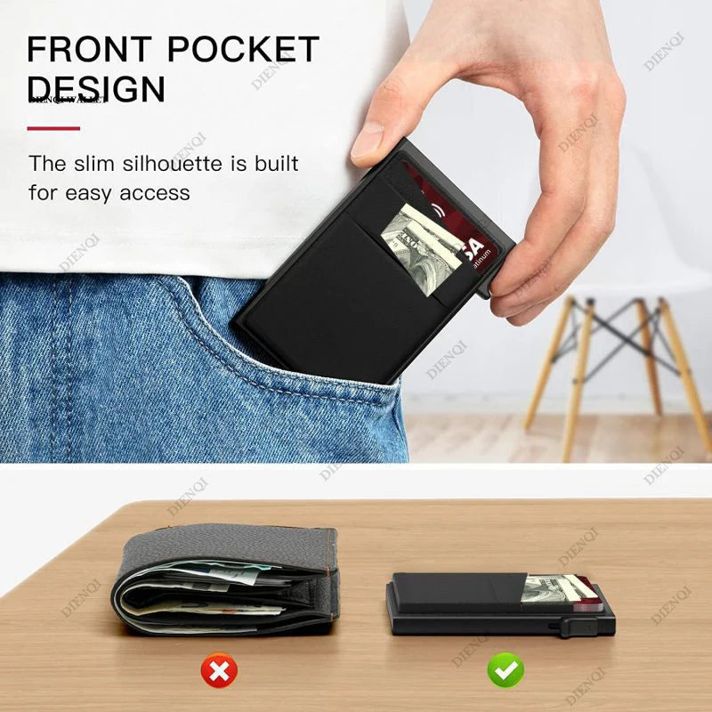 A hand places a black metal RFID blocking card holder into the front pocket of a denim shirt.