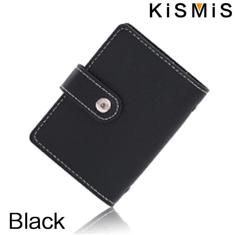 Black KisMIS slim leather card holder with a stitched edge and a metal closure.