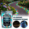 Bag of multicolor glow-in-the-dark solar pebbles used for garden and pathway decoration