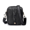 Black genuine cow leather crossbody bag with crocodile texture and black strap