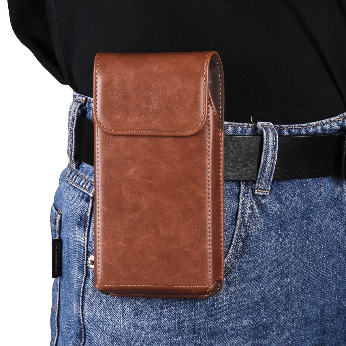 A brown leather belt loop phone case is shown attached to a denim jean pocket and belt.