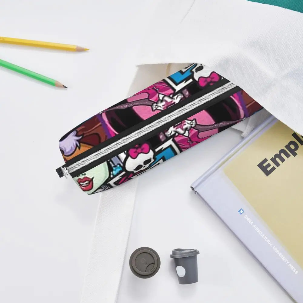 A black and pink patterned leather pencil case is shown next to a notebook and pencils on a white background.