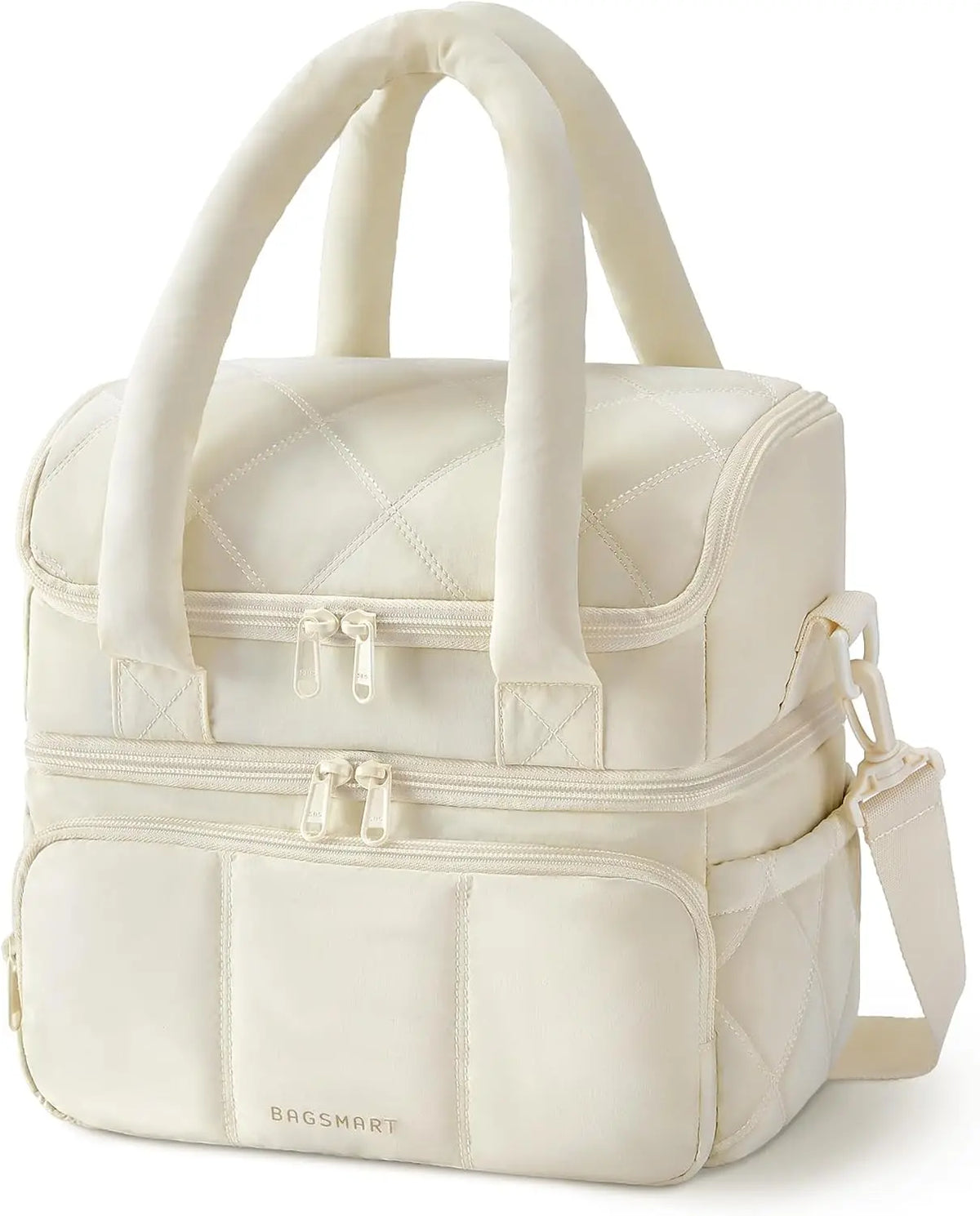 A cream-colored quilted insulated lunch bag with carrying handles and zippered compartments.
