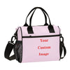 A pink insulated multifunctional picnic lunch bag with black handles and a mesh pocket.