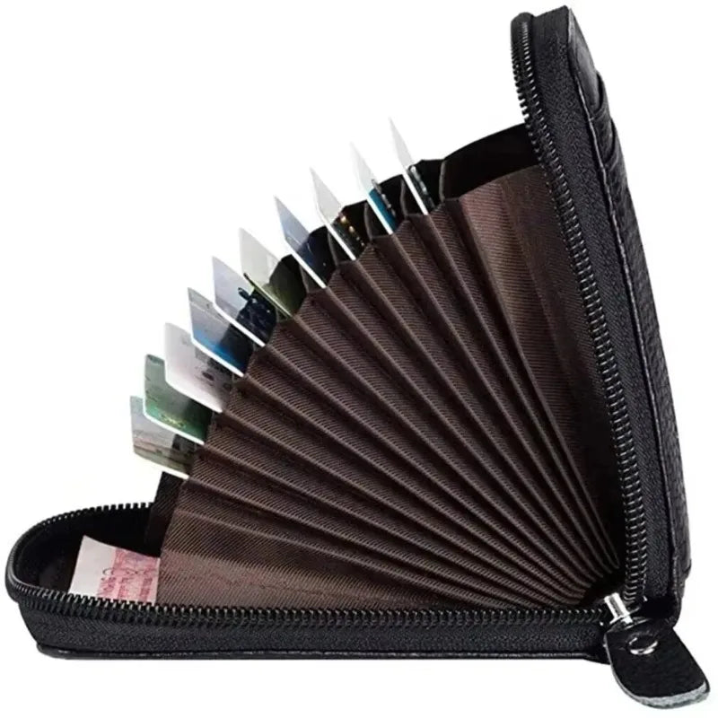A black slim leather wallet with a zippered compartment showing multiple cards and a protective flap.