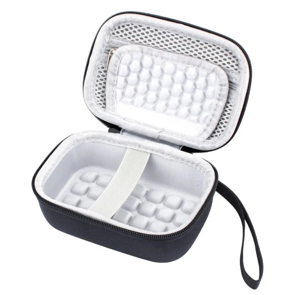 A black hard shell case with a clear plastic lid and padded interior for protecting digital cameras.