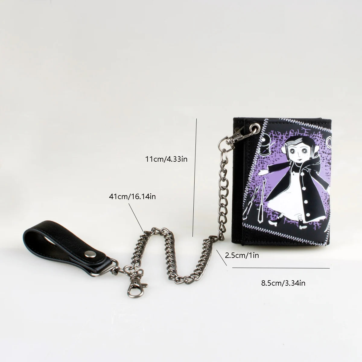 A black tri-fold chain card holder wallet with a purple and white illustration of a girl.