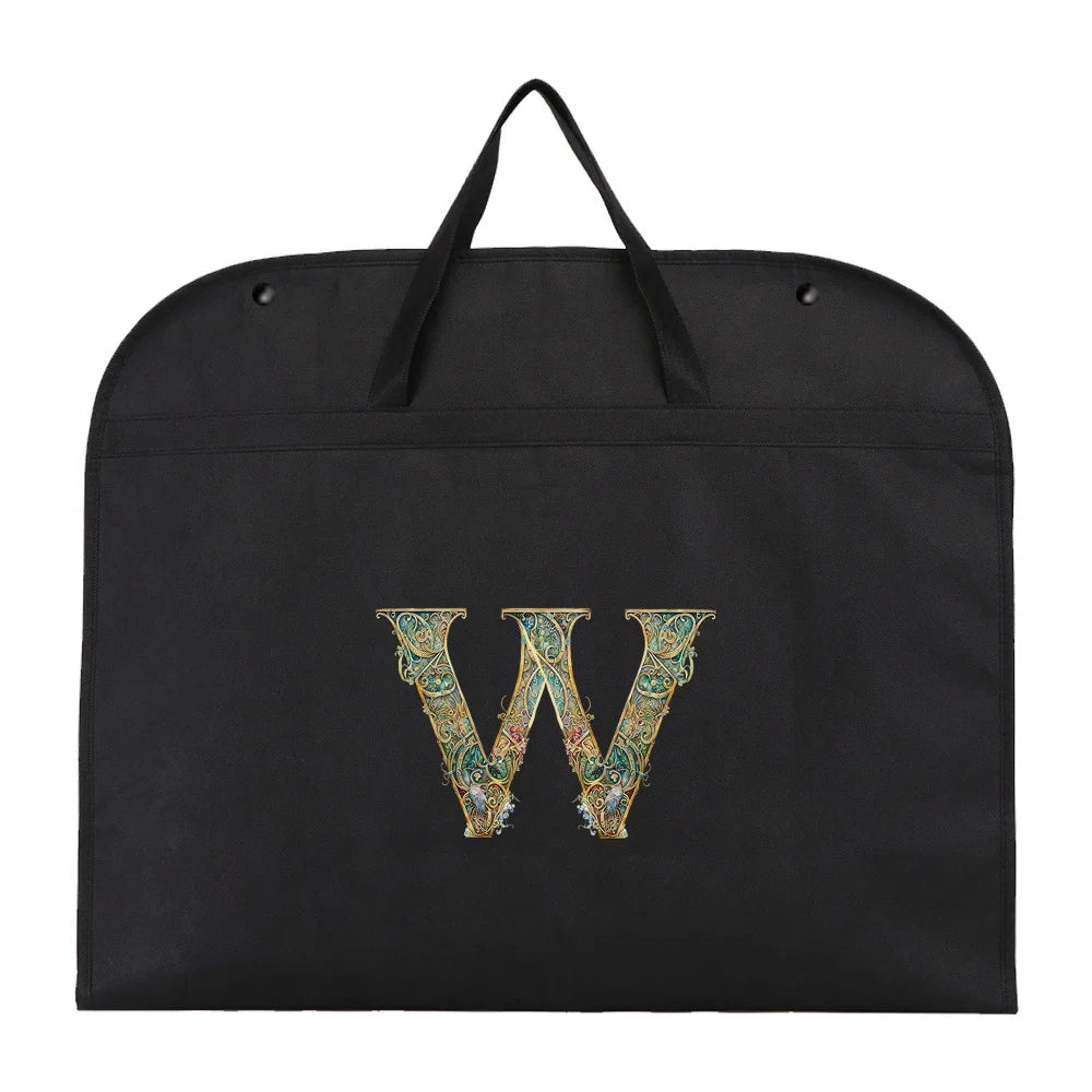 Black fabric dust cover and storage bag with a gold initial W embroidered on it.