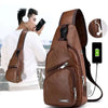 A brown men's casual crossbody chest bag with a USB charging port is shown being worn by a man.