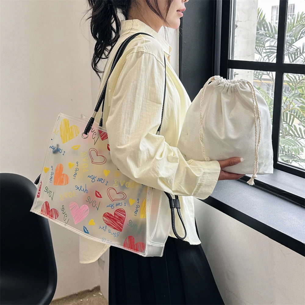 A person holds a white canvas bag and a black strap, next to a window.