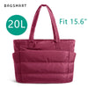 Sac fourre-tout rembourré magenta avec poignée, montré sur fond blanc.