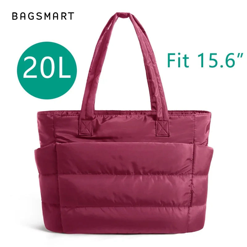 Sac fourre-tout rembourré magenta avec poignée, montré sur fond blanc.