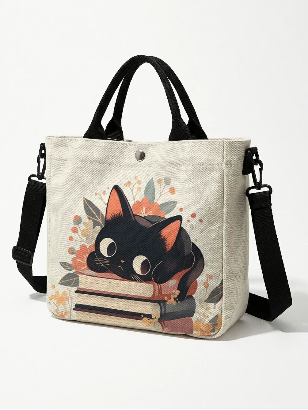 Beige Tasche mit schwarzer Katzen- und floraler Druck und schwarzem Riemen.