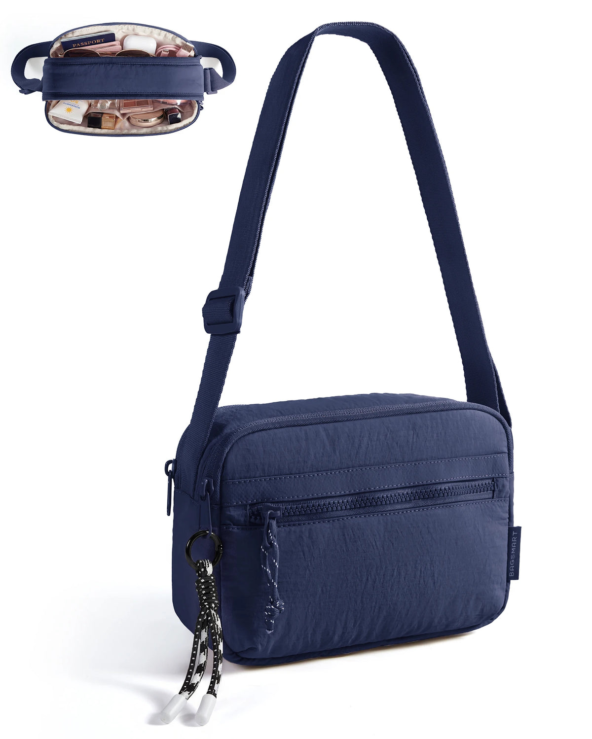 A navy blue crossbody shoulder bag with a leather strap and a zippered pocket is shown against a white background.