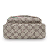 A beige patterned men's crossbody sling bag with a brown leather strap.