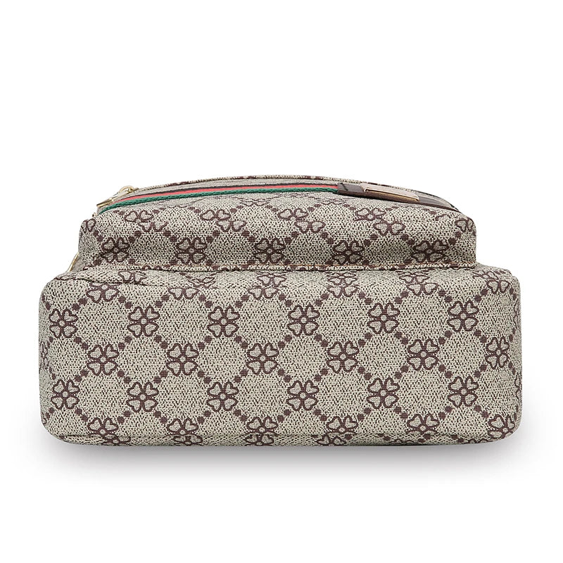 A beige patterned men's crossbody sling bag with a brown leather strap.
