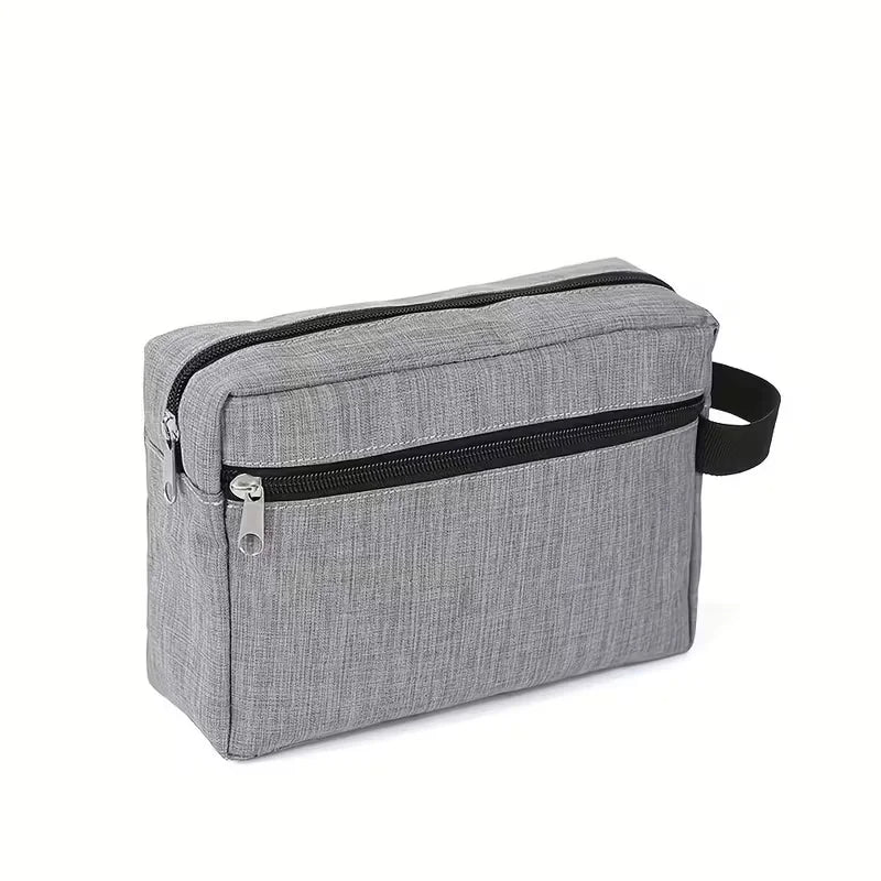 A gray multifunctional travel toiletry bag with a black zipper and strap.