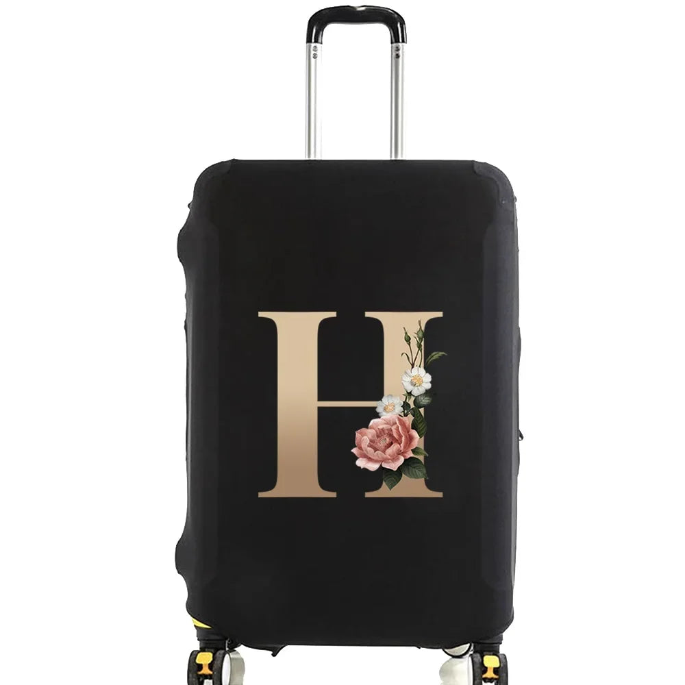 Black premium elastic luggage protective cover with a gold initial H and floral design