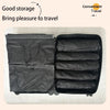 A black reusable vacuum storage bag with multiple compartments is shown on a light surface.