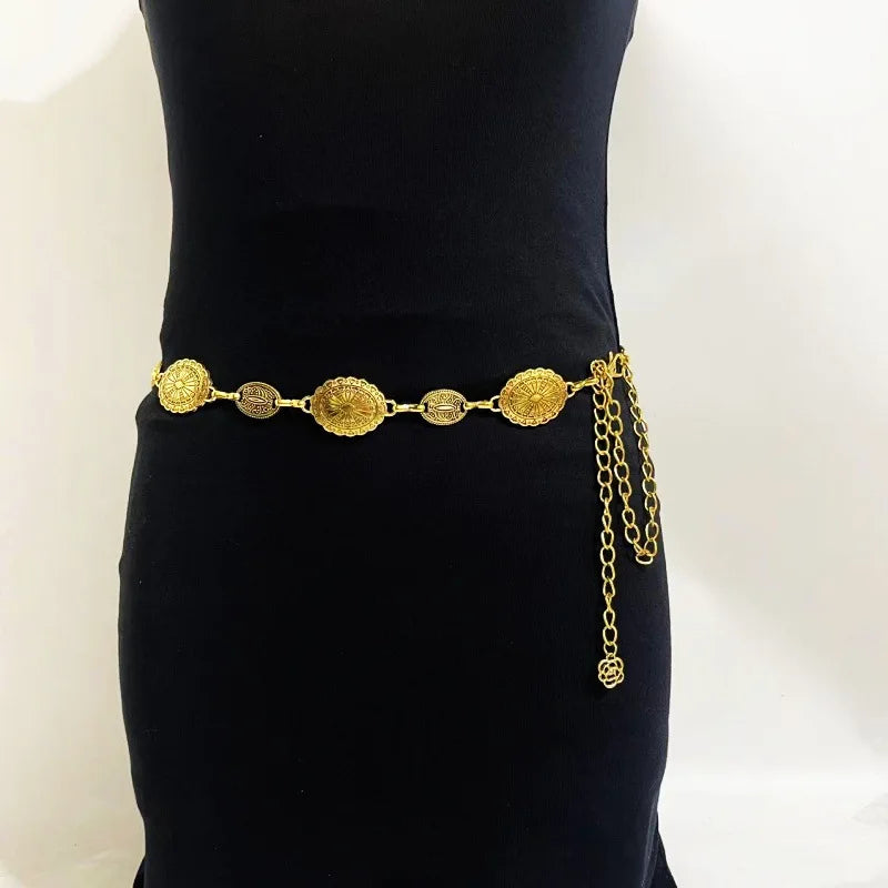 Vintage gold plated sunflower smiley face waist chain displayed on a black background.